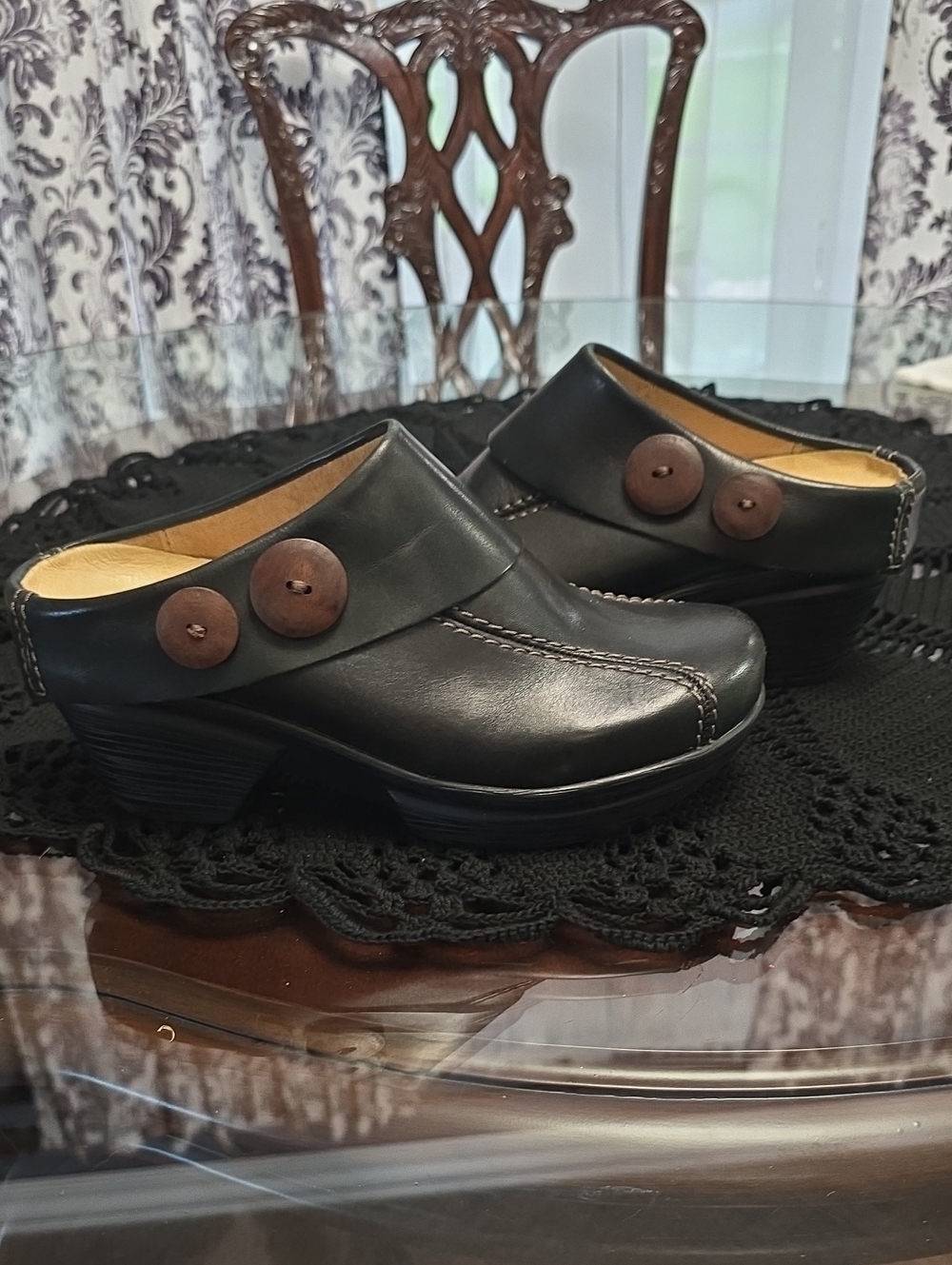 Sanita Black Leather Clog Mules with Brown Button Accent